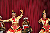 Kandyan dancing and drumming - the Puja dance with female dancers with votive oil lamps. 