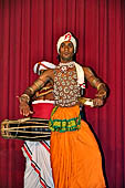 Kandyan dancing and drumming. In the pantheru dance, the dancers perform with a tambourine acrobatics and a series of rhythmic patterns.