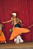 Kandyan dancing and drumming. In the pantheru dance, the dancers perform with a tambourine acrobatics and a series of rhythmic patterns.