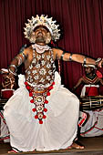 Kandyan dancing and drumming, The Ves Dance, performers in the traditional attire combines stylized gestures with acrobatics.