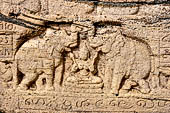 Polonnaruwa - The Quadrangle. The Gal Pota (Book of Stone). Detail of Lakshmi being given a shower by two elephants.