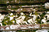 Polonnaruwa - The Hatadage. Weathered frieze on the wall with a representation of dancers.