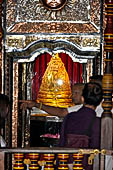 Kandy - The Sacred Tooth Relic Temple, the gold casket that holds the relic seen from the Recitation Hall. 