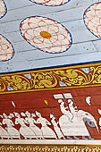 Kandy - The Sacred Tooth Relic Temple, entrance stairway: details of the canopy painted with lotuses and pictures of the perahera.
