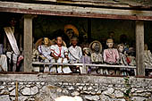 Londa - The entrance to the cave is guarded by a balcony of tau tau.  