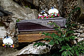 Londa - Burial places, coffins full of bones and skulls lie rotting in piles