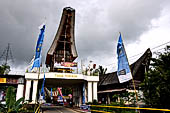 Sulawesi - Gates marked by tongkonan the entrance in the Toraja region.  