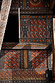 Pallawa - Traditional tongkonan house. The exterior walls are covered with wood panels etched with geometric patterns and painted with black and red colours. 