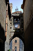 Randazzo - via degli Archi, arches in black pumice stone. 