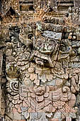 Pura Dalem of Sangsit - Details of the bas-reliefs of the temple front wall. 