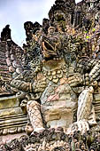 Pura Dalem of Sangsit - Details of the bas-reliefs of the temple front wall. 
