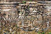 Pura Dalem of Sangsit - Details of the bas-reliefs of the temple front wall. 
