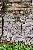 Pura Dalem of Sangsit - Details of the bas-reliefs of the temple front wall with erotic pictures and gruesome depictions of the hell. 