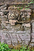 Pura Dalem of Sangsit - Details of the bas-reliefs of the temple front wall. 
