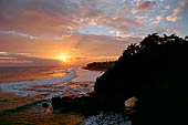 Bali - Resort close to the black sands of Suraberata beach in the Tabanan region. Sunset.