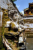 Goa Gajah - the bath sanctuary with six beautiful stone nymphs representing Wadadari holding vases as waterspouts.