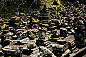 Goa Gajah - an assortment of large old stone carvings.