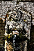 Goa Gajah - the bath sanctuary with six beautiful stone nymphs representing Wadadari holding vases as waterspouts.