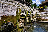 Goa Gajah - the bath sanctuary with six beautiful stone nymphs representing Wadadari holding vases as waterspouts.