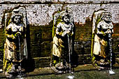 Goa Gajah - the bath sanctuary with six beautiful stone nymphs representing Wadadari holding vases as waterspouts.