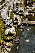 Goa Gajah - the bath sanctuary with six beautiful stone nymphs representing Wadadari holding vases as waterspouts.