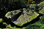 Goa Gajah - the small archaeological area with Buddhist relics on the south of the cave. 