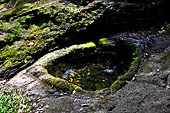 Goa Gajah - the small archaeological area with Buddhist relics on the south of the cave. 