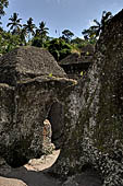 Gunung Kawi (Bali) - Alleged main monastery with rock-hewn monastic cells and a monolith in the middle of yet unknown significance.