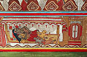 Detail of a panel from the Bale Kambang, Floating Pavilion, in the Kerta Gosa complex, Klungkung Semarapura, Bali. This panel depicts a scene from the Pan and Men Brayut story showing Men Brayut nursing several of her eighteen children. 