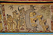 Klungkung - Bali. The Kerta Gosa palace, paintings of the lower levels.  This panel shows Bima upturning the cow-headed cauldron to free the humans who are being boiled inside in punishment for their earthly transgressions. 