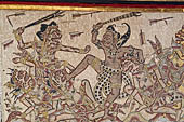 Klungkung - Bali. The Kerta Gosa palace, paintings of the lower levels This episode shows the hero Bima, dressed in the black and white checked cloth, in battle with several of the demonic figures who inhabit the underworld. 