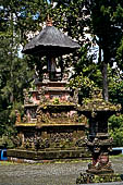 Pura Luhur Batukau - Bali - The Kulkul alarm tower with statues of directional protectors.