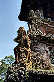 Pura Luhur Batukau - Bali - The Kulkul alarm tower with statues of directional protectors.
