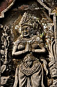 Pura Luhur Batukau - Bali - The Candi Bentar (split gate) of the first courtyard. Sculptural details.