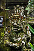 Pura Luhur Batukau - Bali - Secondary shine inside the fist courtyard. Detail of the door protectors.