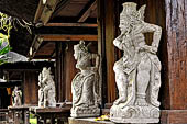 Pura Luhur Batukau - Bali - The inner courtyard. Details of the statues of the protectors of the Meru's.