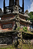 Pura Luhur Batukau - Bali - The Kulkul alarm tower with statues of directional protectors. 