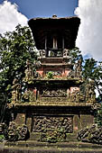 Pura Luhur Batukau - Bali - The Kulkul alarm tower with statues of directional protectors. 