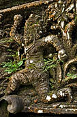 Pura Luhur Batukau - Bali - The Kulkul alarm tower, details of the scenes in the panels of the basement.