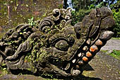 Pura Luhur Batukau - Bali - The Kulkul alarm tower, detail of the decoration. 