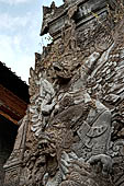 Pura Meduwe Karang - Bali - Wall Sculpture of Garuda above the snake entwined around the underworld turtle decorating the back wall of the central shrine.