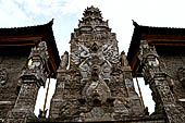 Pura Meduwe Karang - Bali - Wall Sculpture of Garuda above the snake entwined around the underworld turtle decorating the back wall of the central shrine.
