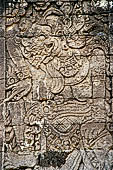 Pura Meduwe Karang - Bali - Reliefs adorning the basement walls of the central shrine, which show people and scenes from everyday life. 