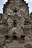 Pura Meduwe Karang - Bali - Wall Sculpture of Garuda above the snake entwined around the underworld turtle decorating the back wall of the central shrine.