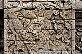 Pura Meduwe Karang - Bali - Reliefs adorning the basement walls of the central shrine, which show people and scenes from everyday life.
