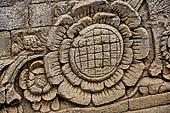 Pura Meduwe Karang - Bali - The famous relief of the Cyclist, a westerner on a bicycle is depicted on the side of the main shrine. 