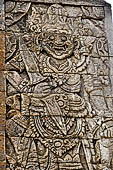 Pura Meduwe Karang - Bali - Reliefs adorning the basement walls of the central shrine, which show people and scenes from everyday life.