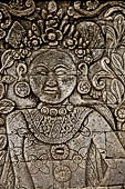 Pura Meduwe Karang - Bali - Reliefs adorning the basement walls of the central shrine, which show people and scenes from everyday life. 
