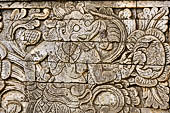 Pura Meduwe Karang - Bali - Reliefs adorning the basement walls of the central shrine, which show people and scenes from everyday life.