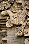 Pura Meduwe Karang - Bali - Reliefs adorning the basement walls of the central shrine, which show people and scenes from everyday life.